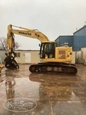 Side of Used Komatsu Excavator